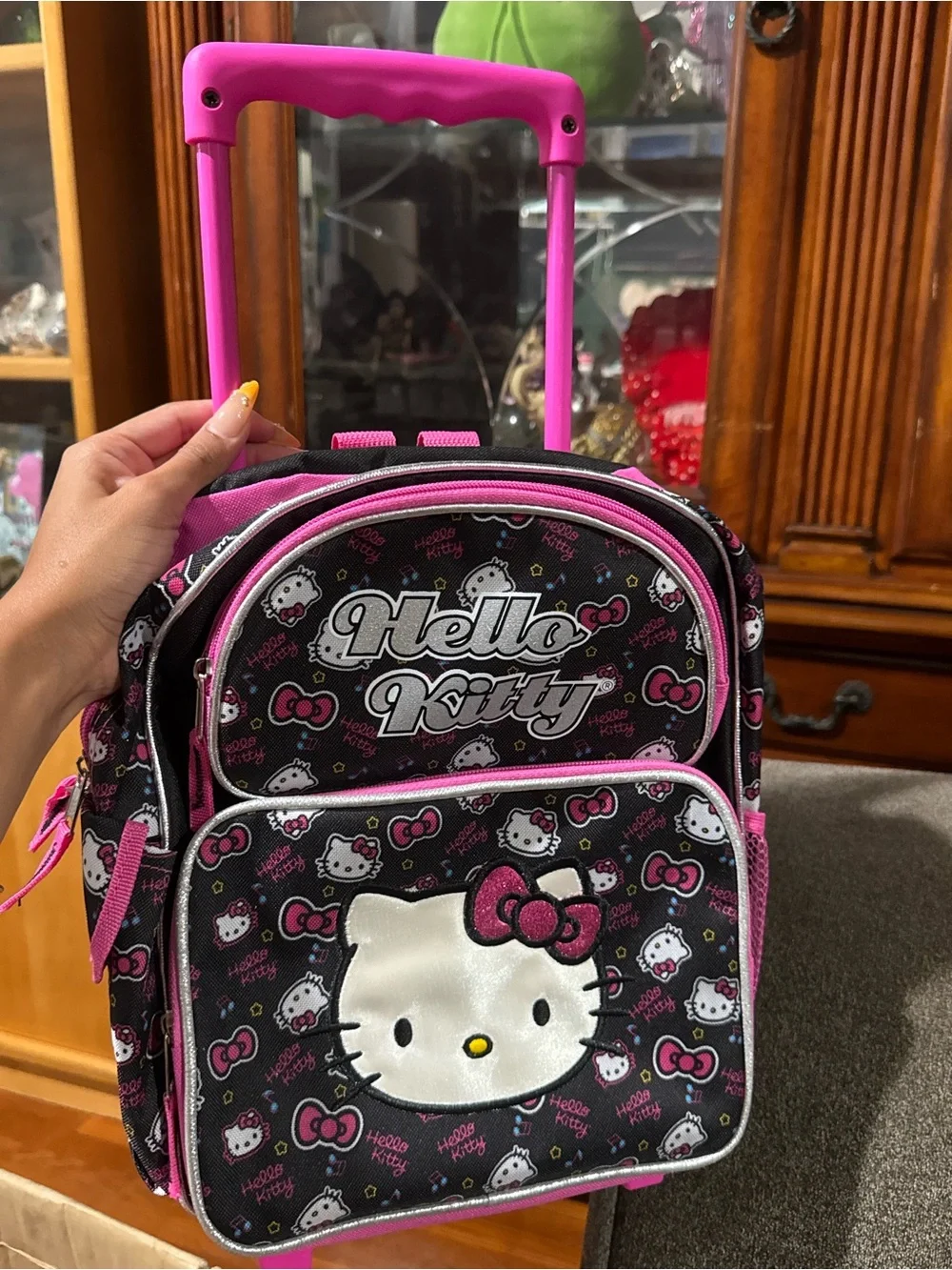 Hello Kitty Black and Pink Rolling Luggage